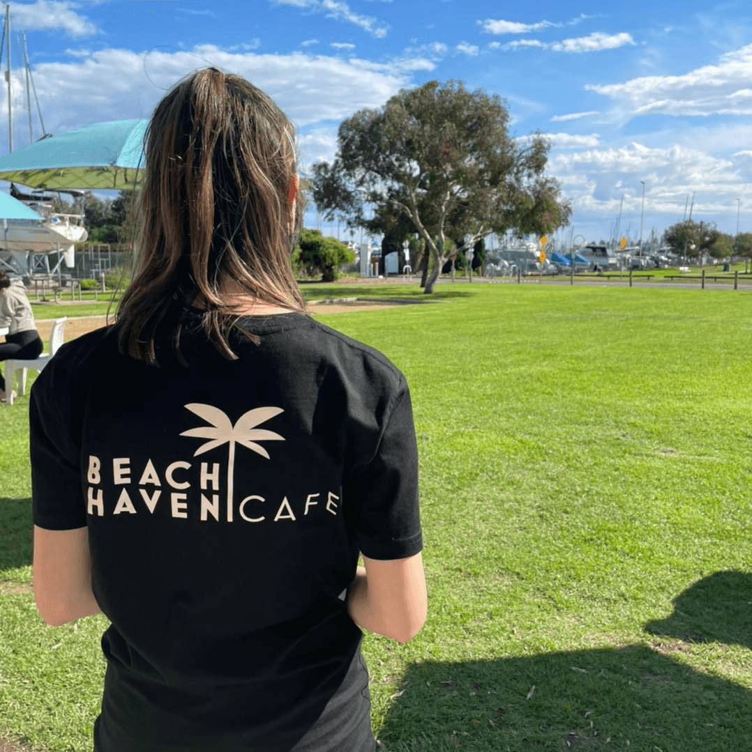 Beach Haven Cafe team member overlooking the marina
